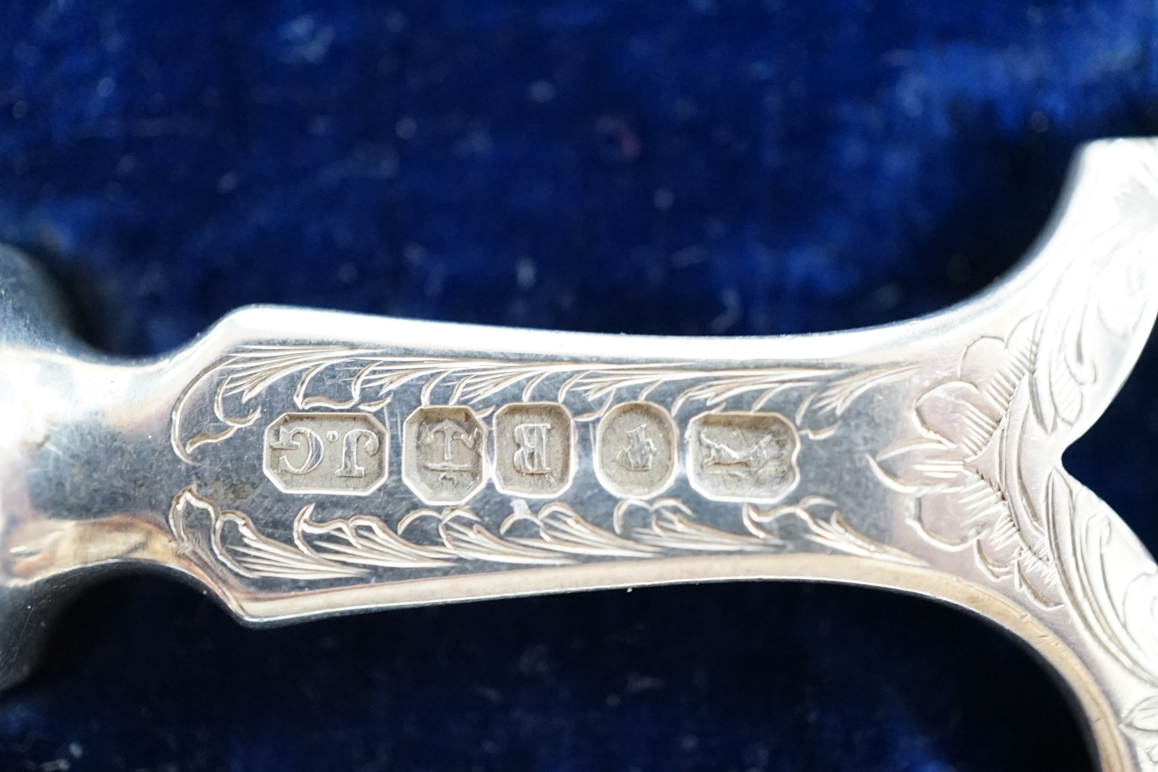 A cased pair of Victorian fish servers, by John Gamage?, Birmingham, 1850, slice 31.9cm. Condition - poor